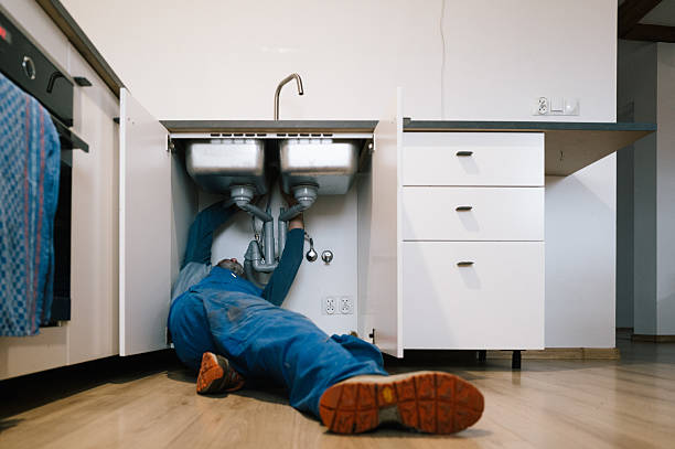 Professional Emergency Plumber technician working in Ira, IA